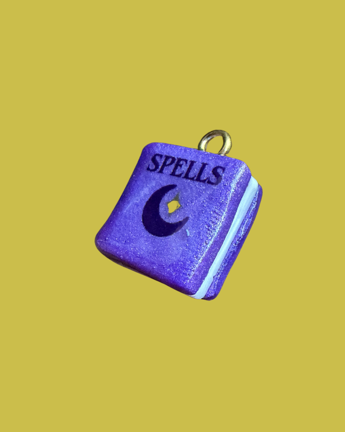 Purple spell book charm